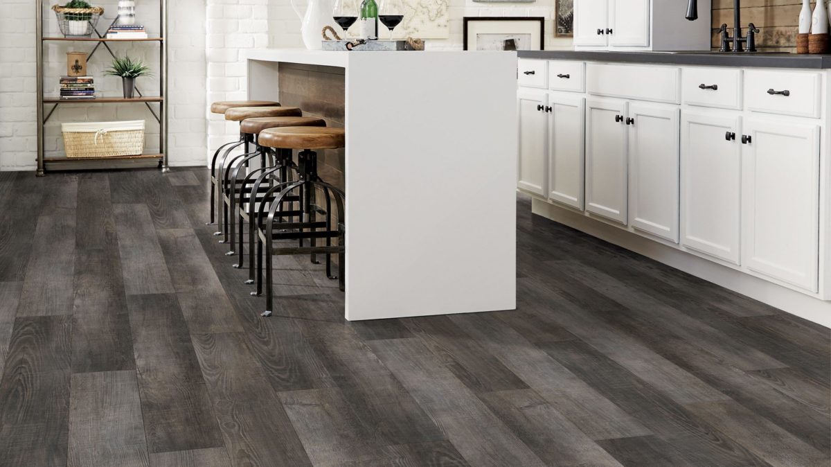 Armstrong Flooring kitchen design with saddle stool and white cabinets
