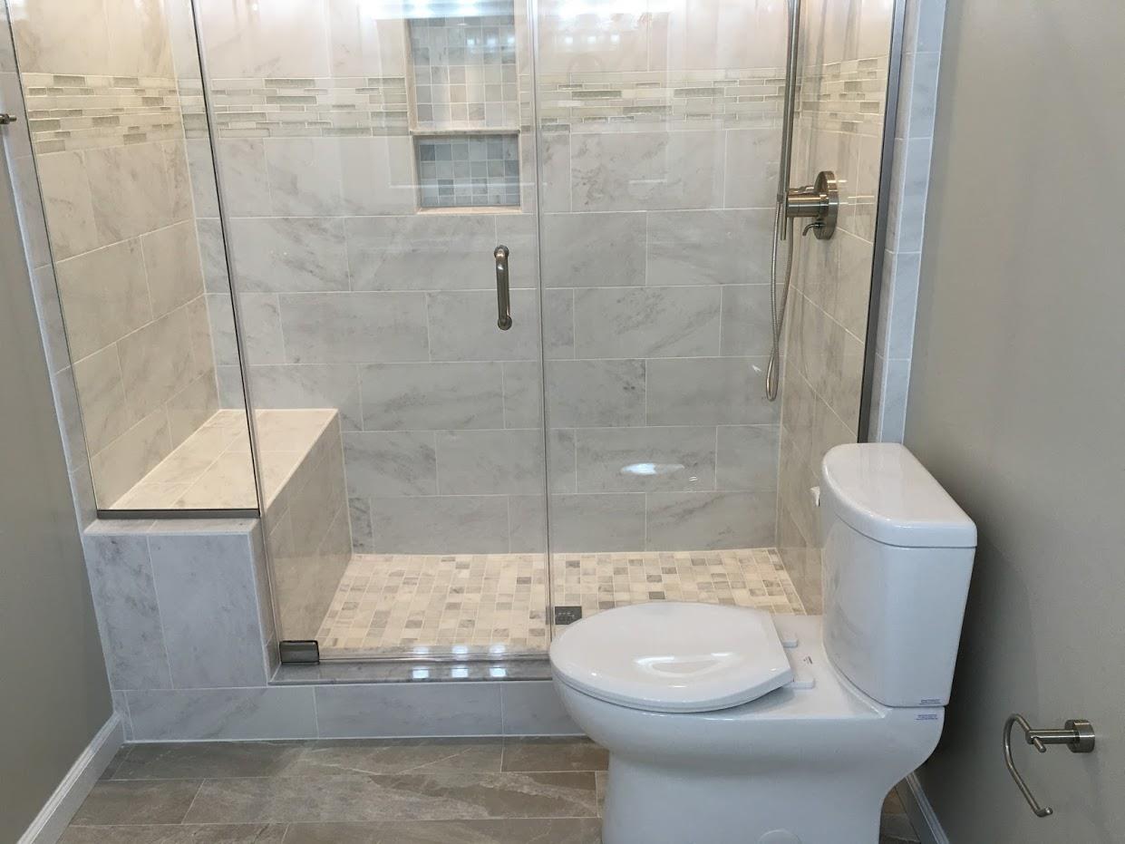 Closer image of shower room with toilet setup