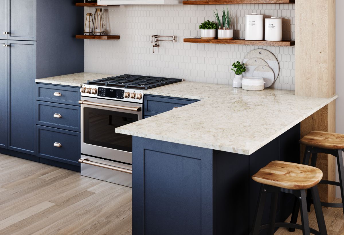 Cambria Countertop Stone with black cabinets and oven