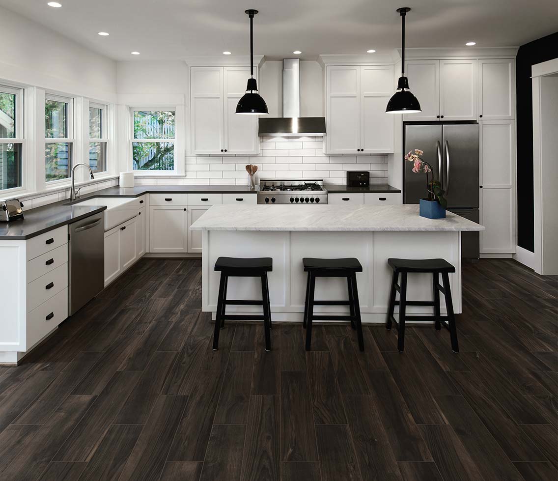 White and black contrast kitchen design and hardwood flooring
