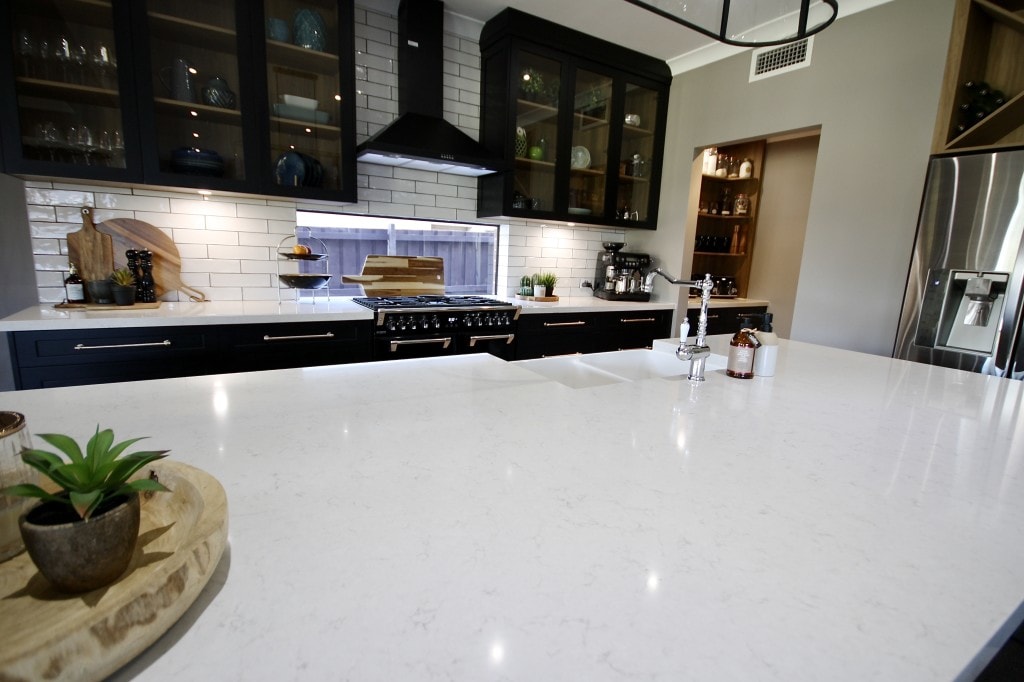 Silestone Countertop in white with wooden cabinets