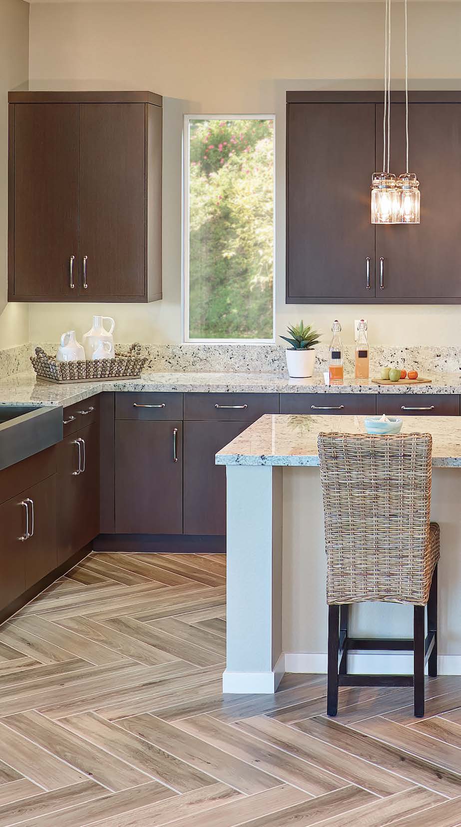 Angled Vista wooden kitchen cabinets with hardwood flooring