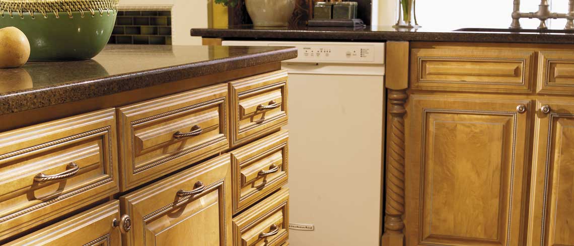 Kitchen cabinets finished in Butterscotch with Nickel glaze