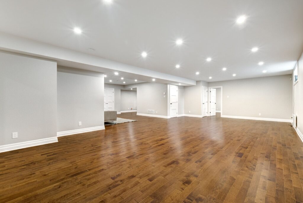basement renovation with new hardwood flooring